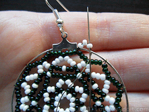 needle up through the last seed bead