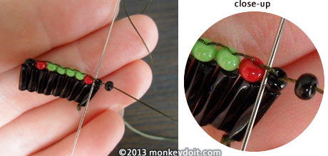 Adding rows of beads on top of the earring
