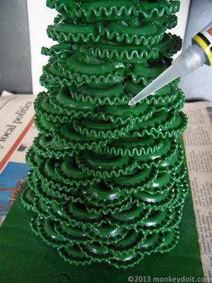 Attach the sugar decorations to branches with super glue