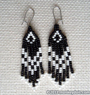 Different designs and colours of beaded earrings