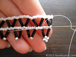 Go through 3 seed bead towards the next chevron.