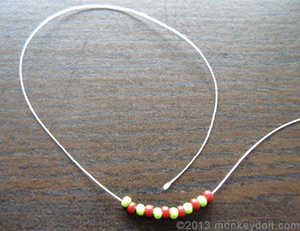 A string of 12 beads on the thread