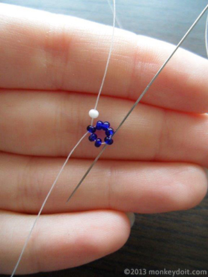 one seed bead of colour A onto the needle and go through the 5th bead B