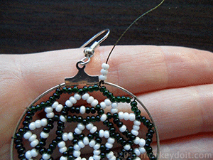 3 seed beads onto the thread