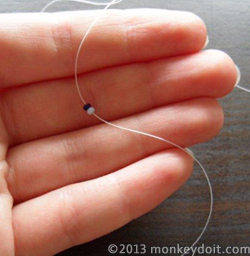 String two beads corresponding to your earring design