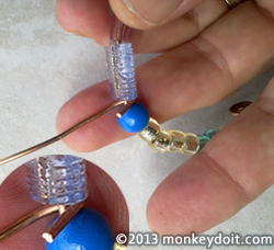 Hooking the bracelet with copper wire