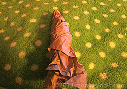 Brown packing paper formed in the shape of a pumpkin stem