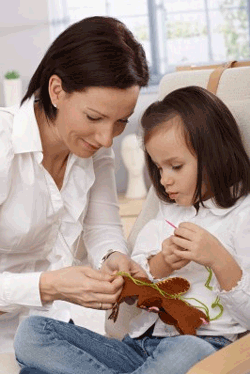 Child mastering a small sewing project